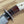 Cargar imagen en el visor de la galería, Cuchillo forjado  “Cowboy Bowie” de Nil Fonsere, con cuero, colmillo de facochero y gemelo a conjunto
