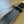 Cargar imagen en el visor de la galería, Cuchillo forjado  “Cowboy Bowie” de Nil Fonsere, con cuero, colmillo de facochero y gemelo a conjunto
