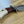 Cargar imagen en el visor de la galería, Cuchillo forjado  “Cowboy Bowie” de Nil Fonsere, con cuero, colmillo de facochero y gemelo a conjunto
