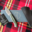 Cargar imagen en el visor de la galería, Cuchillo multitarea forjado Beetle de Alejandro Medrano, micarta verde
